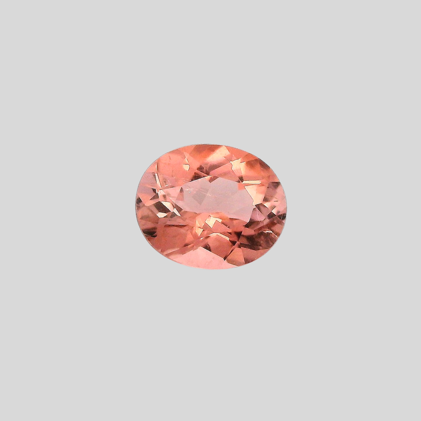 vue de face tourmaline ovale couleur pêche, 1.40 carat, pays afganitsan