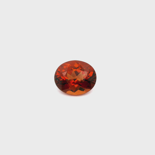 video d'un grenat malaya de 2.51 carat, taille ovale, pierreries gemmes france
