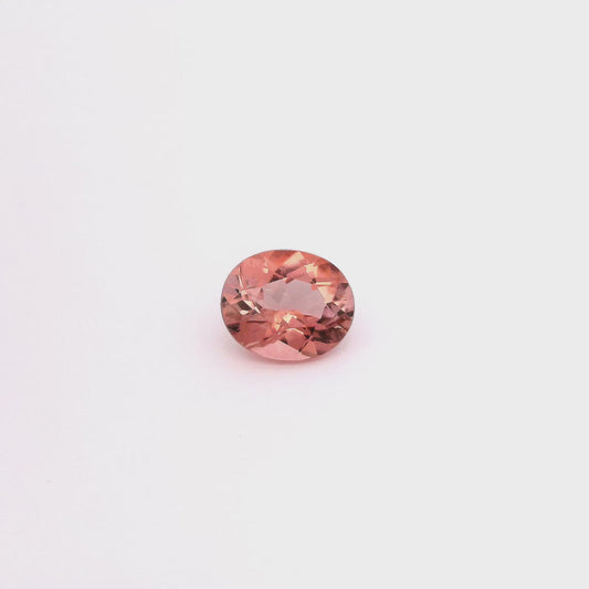 vidéo d'une belle tourmaline couleur pêche, taille ovale, pierreries gemmes france